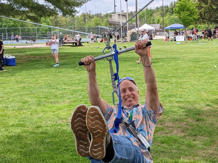 Senor Kerry Chamberlin takes a turn at the zip line at Memorial Field during Spring Fling 2022. The zip line was set up by the ROPE class taught by Frank Harrison and Matt Skoby.