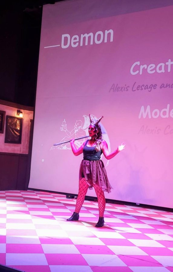 Alexis Cohen models the Demon look created by Alexis Lesage and Elle Despres  at the Mythical Hair! Hair Show 2022 at Concord High School. 