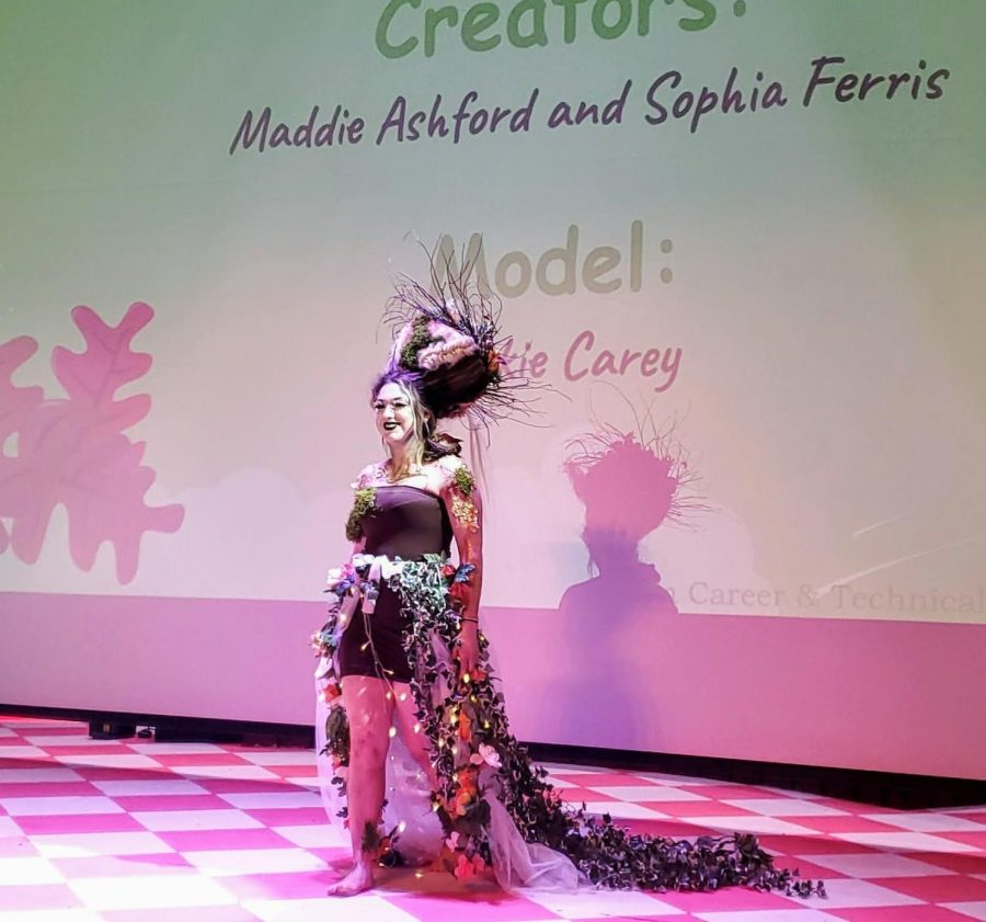 Jackie Carey models the Mother Nature look created by Maddie Ashford and Sophia Ferris at the Mythical Hair! Hair Show 2022 at Concord High School.