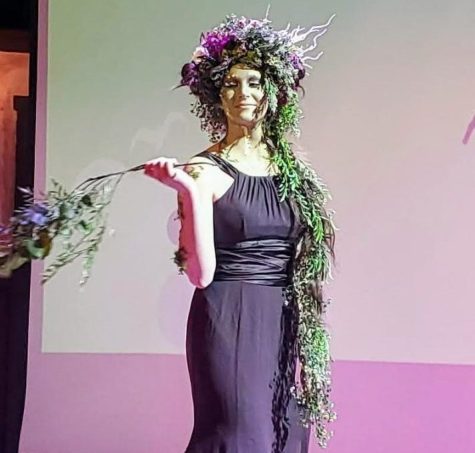 Alyssa Mulholland models the Troll look created by Sophia Nelson and Lacie Sleeper at the Mythical Hair! Hair Show 2022 at Concord High School.