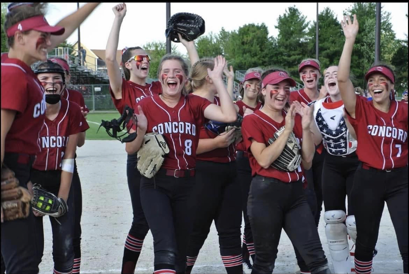 Players celebrate a win on their way to the 2022 state championship final Saturday, June 11, at D&M Field at Plymouth State University.
