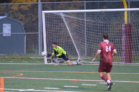 Goalie Nater Wachter makes a save during the Fall 2022 season.