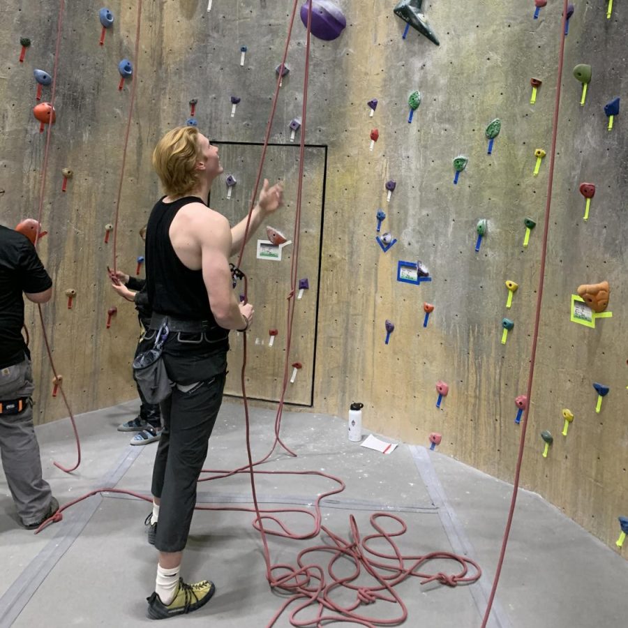 CHS senior Avery Mahon prepares to climb during a January competition at NH Climbing and Fitness here in Concord.