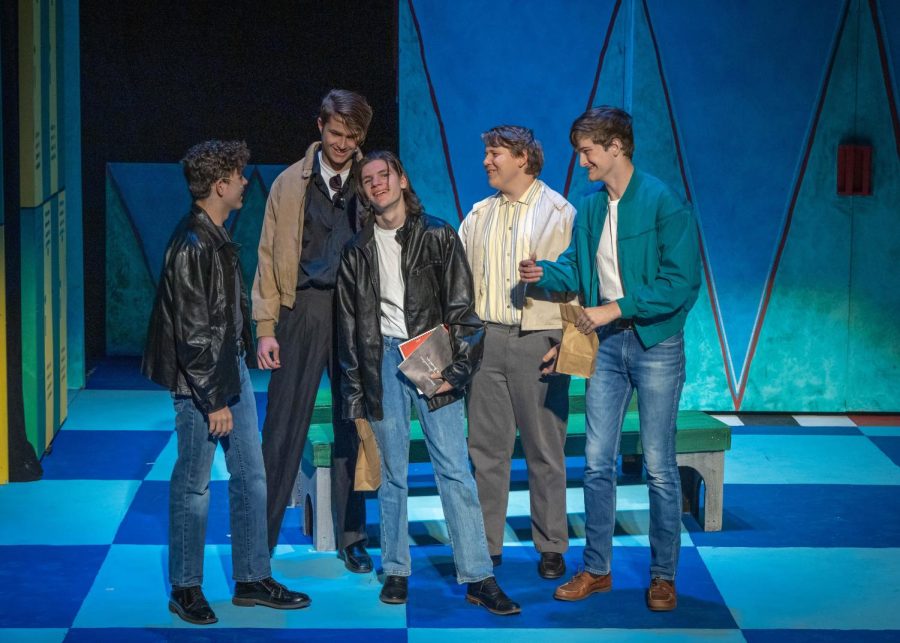 Ryder Fisk (Kenickie), Colin Sheehan (Sonny), Gavin Johnson (Danny), Shaun Wicks (Roger) and Caleb Mitchell (Eugene) in an early scene from the play.