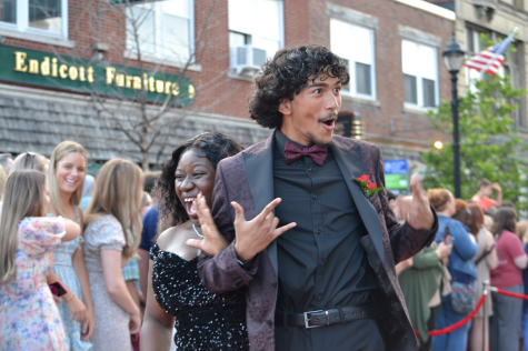 Meta Mako and Ajay Darjee bring the energy to prom as they make their way down the red carpet on South Main Street Thursday, June 15, 2023. 
