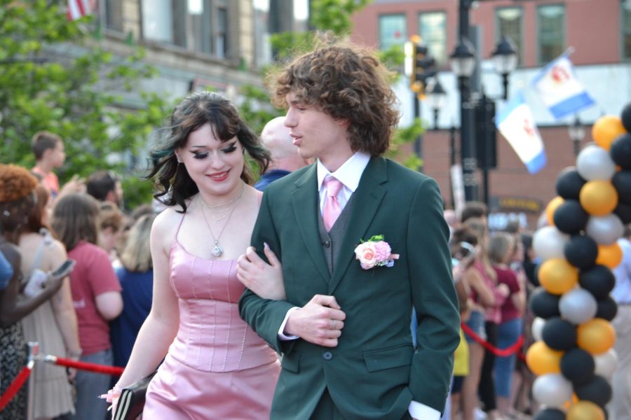 Avery Cyr and Aiden Knowles walk the red carpet before the prom at Bank of New Hampshire Stage on South Main Street Thursday, June 15, 2023.