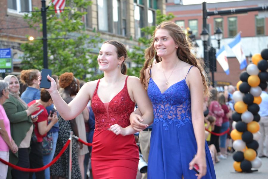 Alison Hunger and Caroline Michaud walk the red carpet before the prom at Bank of New Hampshire Stage on South Main Street Thursday, June 15, 2023.