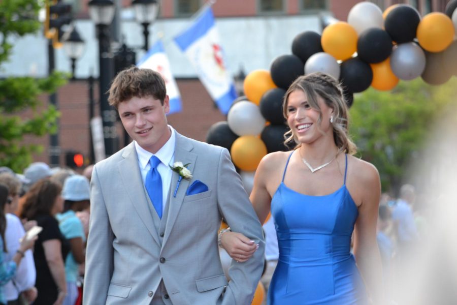 Jack Shoemaker and Kennedy Craigue walk the red carpet before the prom at Bank of New Hampshire Stage on South Main Street Thursday, June 15, 2023.