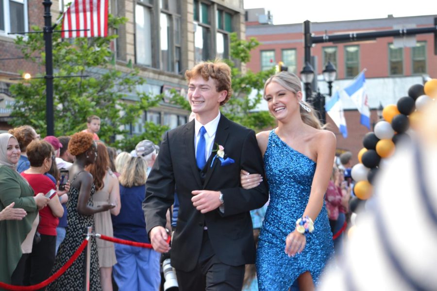 Brett McDonough and Ava Woodman walk the red carpet before the prom at Bank of New Hampshire Stage on South Main Street Thursday, June 15, 2023.