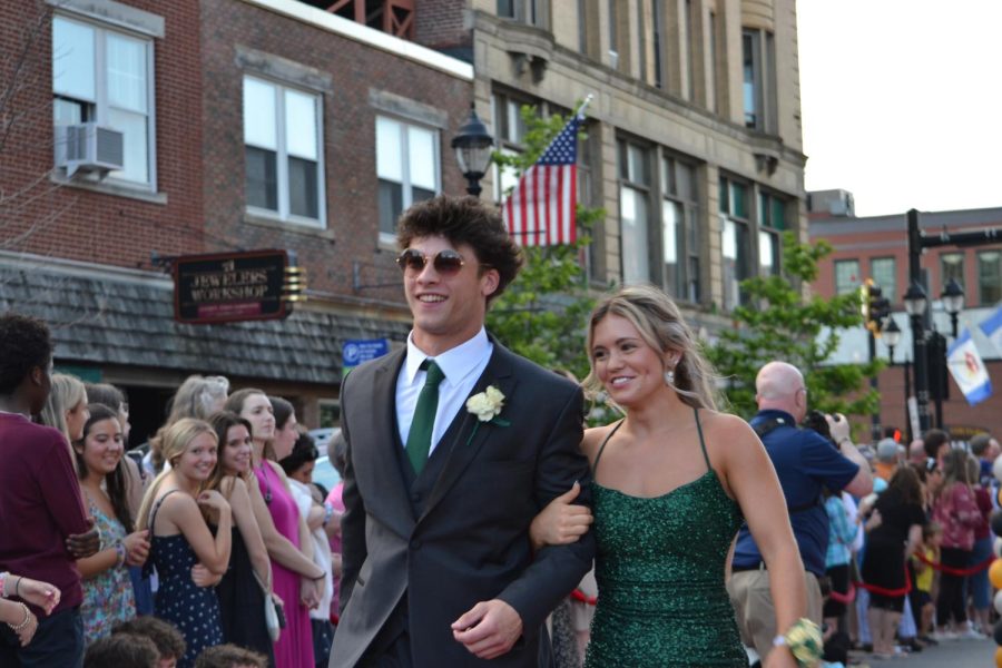 Zach McCoy and Caroline Quirk walk the red carpet before the prom at Bank of New Hampshire Stage on South Main Street Thursday, June 15, 2023.