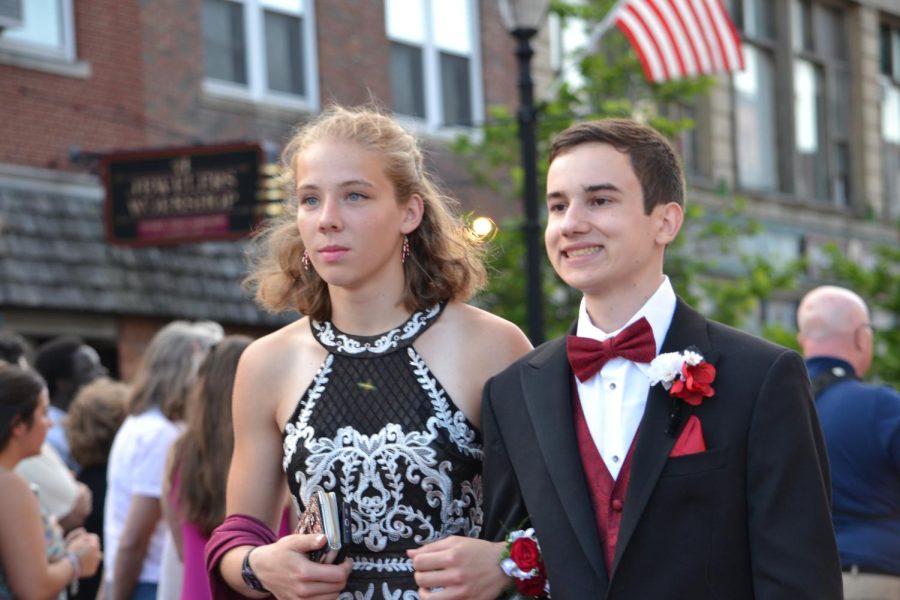 Katie Muehler and Roy Annis walk the red carpet before the prom at Bank of New Hampshire Stage on South Main Street Thursday, June 15, 2023.